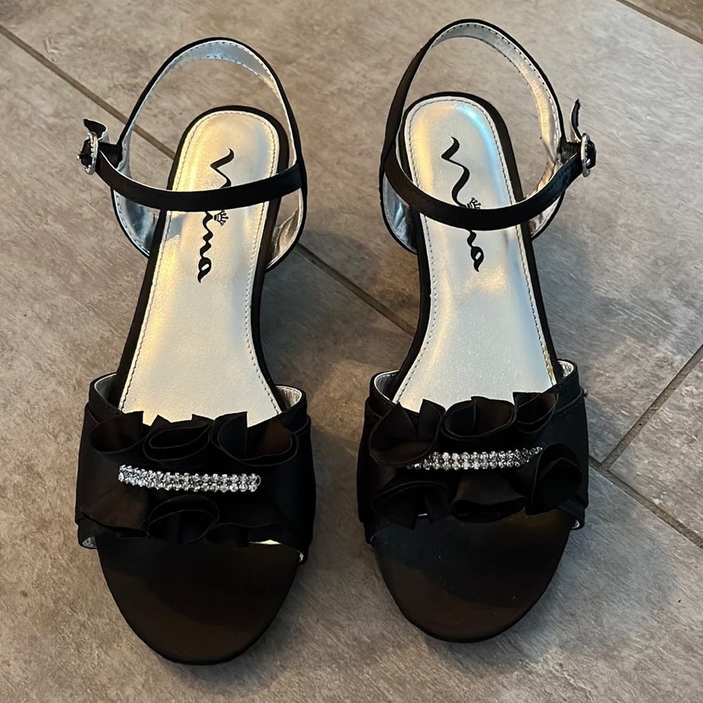 Beautiful black dress shoe for young girl.